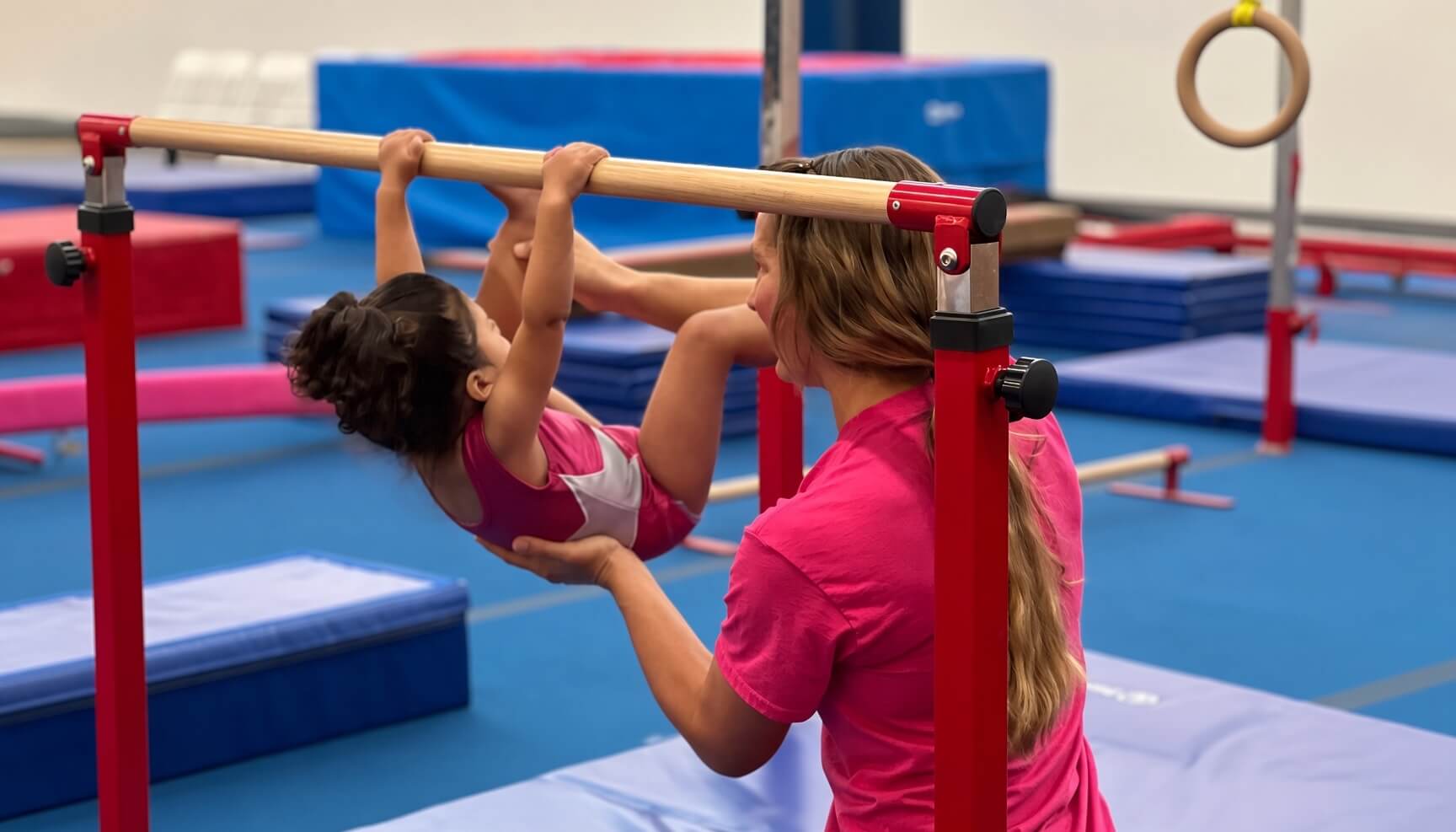 Young athletes in a preschool gymnastics class